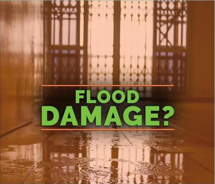 The words "Flood Damage?" in orange with water as the watermark.